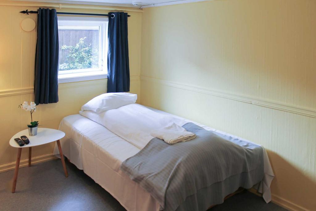 Chambre Triple avec Toilettes Communes