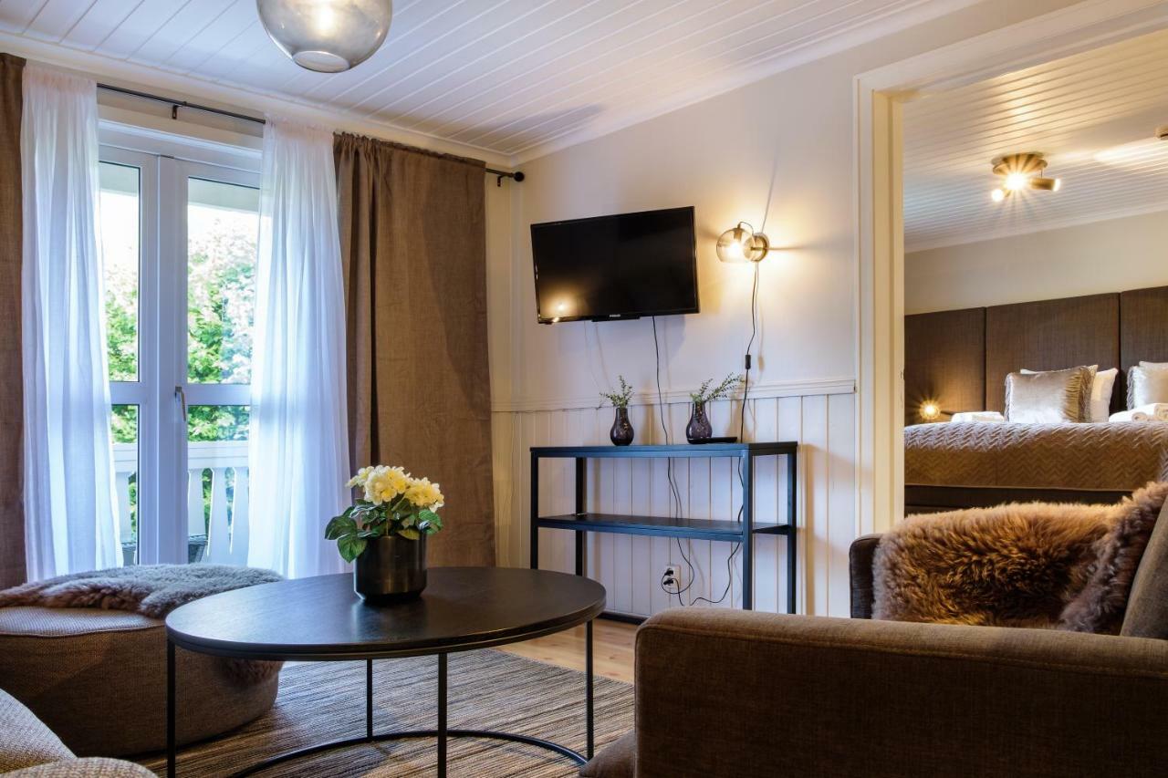 Suite med king-size-seng og balkong